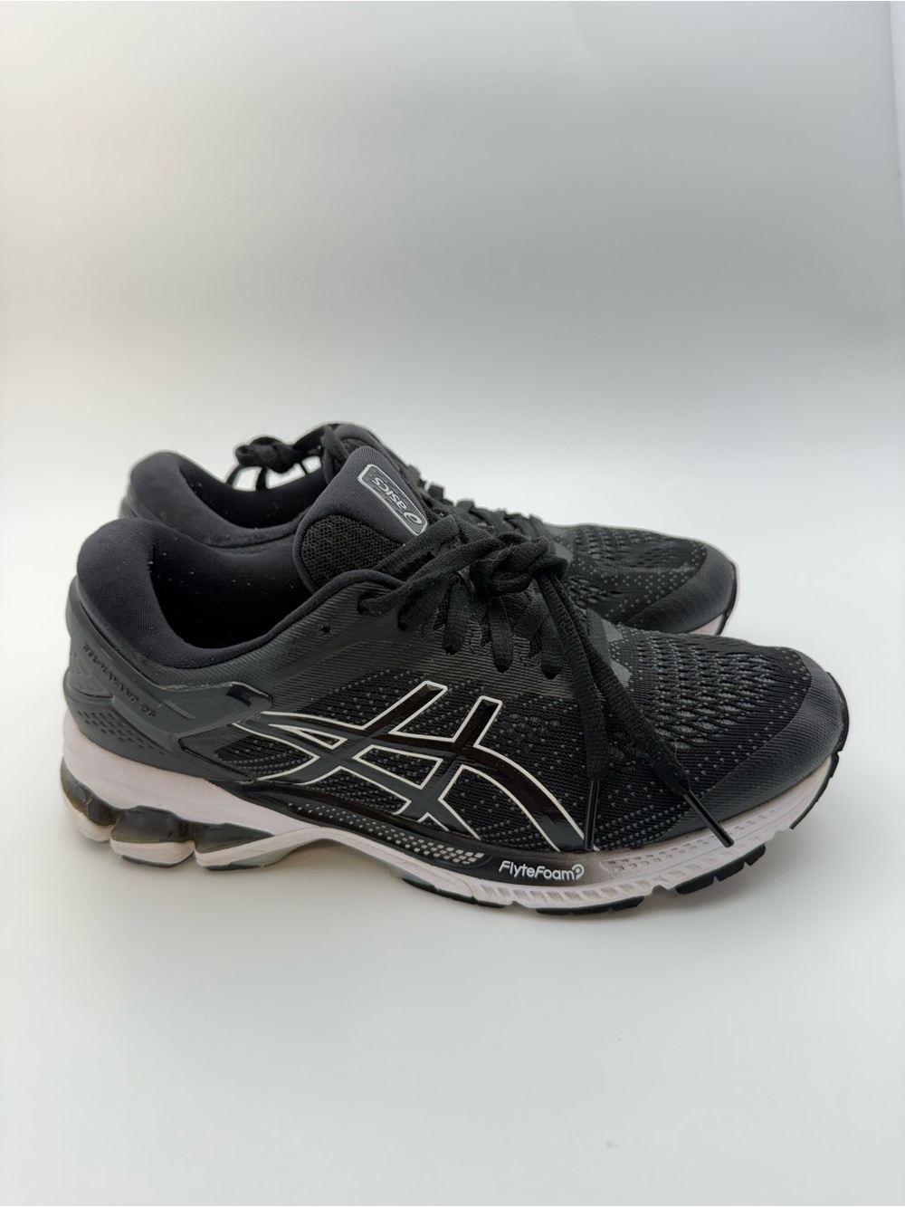ASICS Women's Black Athletic Running Shoes with White Accents